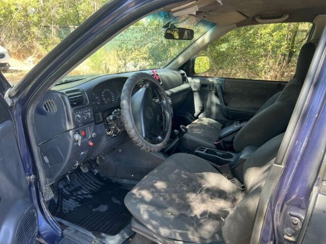 Зеленый Опель Фронтера, объемом двигателя 2.5 л и пробегом 100 тыс. км за 2000 $, фото 6 на Automoto.ua