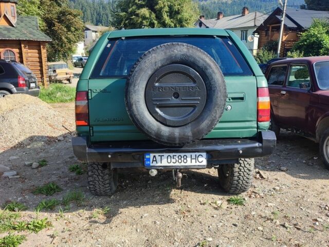 Зеленый Опель Фронтера, объемом двигателя 2.5 л и пробегом 238 тыс. км за 4800 $, фото 3 на Automoto.ua