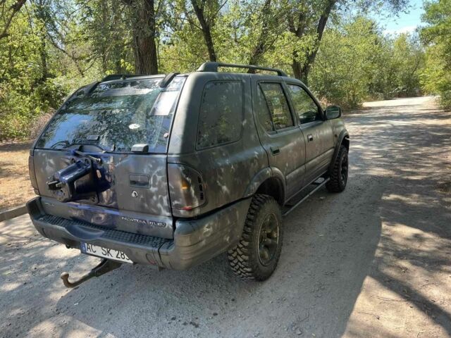 Зеленый Опель Фронтера, объемом двигателя 2.5 л и пробегом 100 тыс. км за 2000 $, фото 2 на Automoto.ua