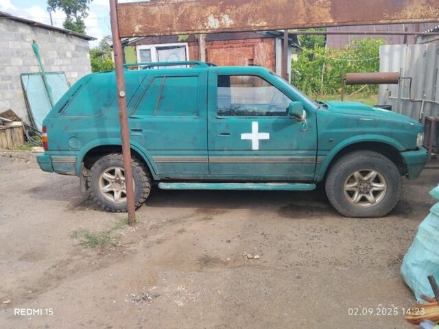 Зеленый Опель Фронтера, объемом двигателя 2 л и пробегом 200 тыс. км за 712 $, фото 4 на Automoto.ua