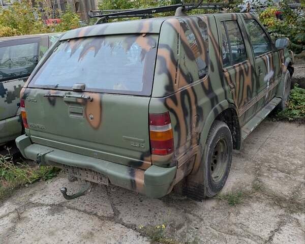 Зеленый Опель Фронтера, объемом двигателя 0 л и пробегом 225 тыс. км за 3800 $, фото 5 на Automoto.ua