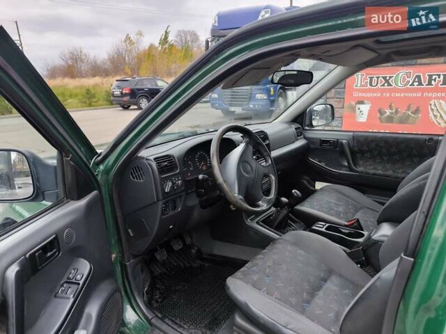 Опель Фронтера 1999 у Луцьку на Automoto.ua Зелений Опель Фронтера, об'ємом двигуна 2.2 л та пробігом 140 тис. км за 10000 $, фото 10 на Automoto.ua