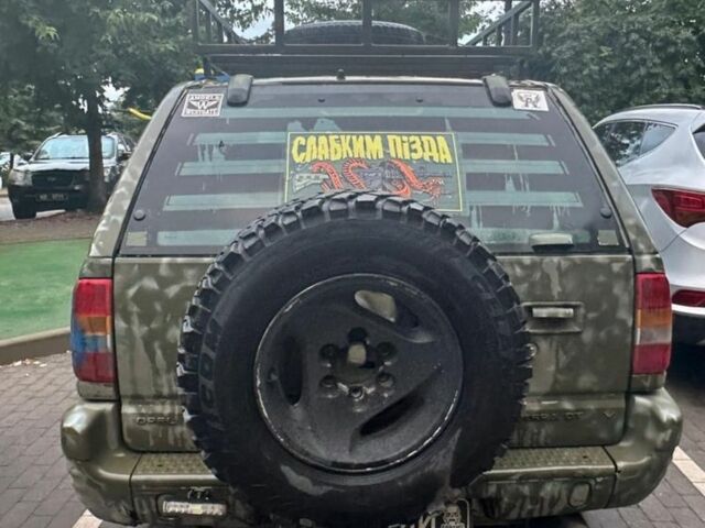 Зеленый Опель Фронтера, объемом двигателя 2.2 л и пробегом 202 тыс. км за 3500 $, фото 3 на Automoto.ua