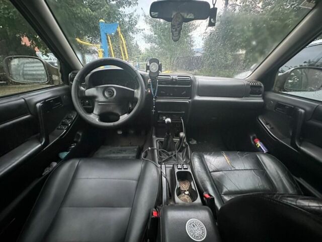 Зеленый Опель Фронтера, объемом двигателя 2.2 л и пробегом 202 тыс. км за 3500 $, фото 4 на Automoto.ua