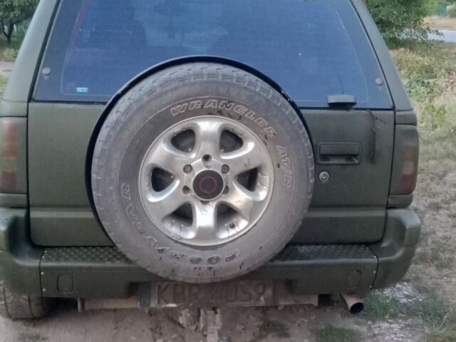 Зеленый Опель Фронтера, объемом двигателя 0 л и пробегом 405 тыс. км за 2379 $, фото 3 на Automoto.ua