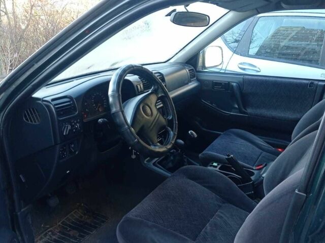 Зеленый Опель Фронтера, объемом двигателя 2.2 л и пробегом 183 тыс. км за 2200 $, фото 4 на Automoto.ua