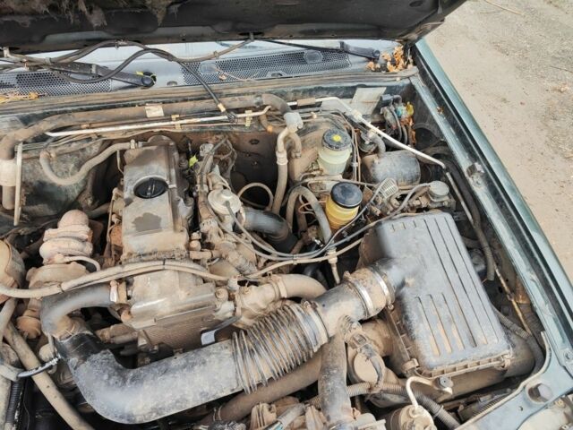 Зеленый Опель Фронтера, объемом двигателя 2.2 л и пробегом 290 тыс. км за 2500 $, фото 4 на Automoto.ua