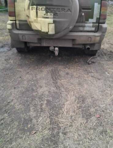 Зеленый Опель Фронтера, объемом двигателя 2.17 л и пробегом 290 тыс. км за 6500 $, фото 4 на Automoto.ua