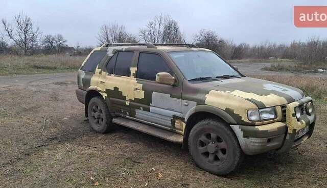 Зеленый Опель Фронтера, объемом двигателя 2.17 л и пробегом 290 тыс. км за 6500 $, фото 1 на Automoto.ua