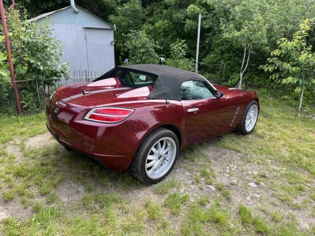 Красный Опель ГТ, объемом двигателя 2 л и пробегом 225 тыс. км за 12500 $, фото 3 на Automoto.ua