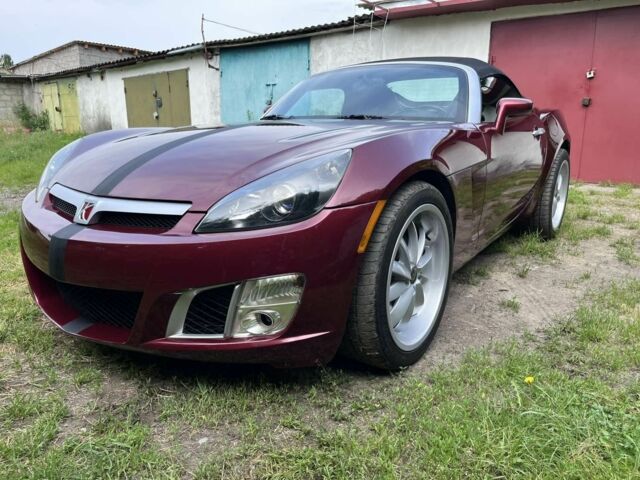 Красный Опель ГТ, объемом двигателя 2 л и пробегом 225 тыс. км за 12500 $, фото 1 на Automoto.ua