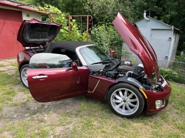 Красный Опель ГТ, объемом двигателя 2 л и пробегом 225 тыс. км за 12500 $, фото 5 на Automoto.ua