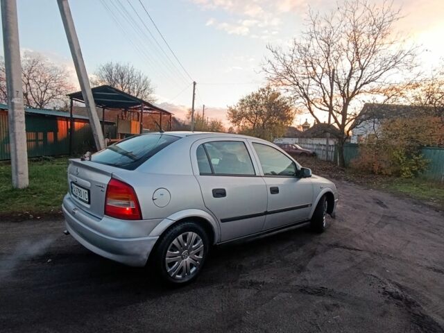 Серый Опель ГТ, объемом двигателя 1.6 л и пробегом 145 тыс. км за 2600 $, фото 5 на Automoto.ua