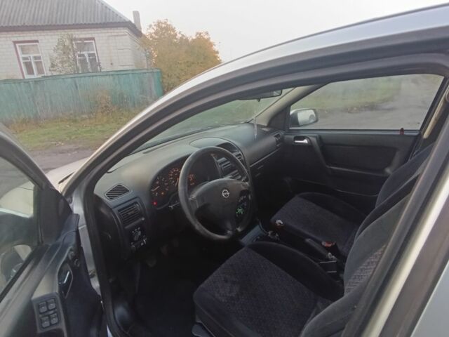 Серый Опель ГТ, объемом двигателя 1.6 л и пробегом 145 тыс. км за 2600 $, фото 7 на Automoto.ua