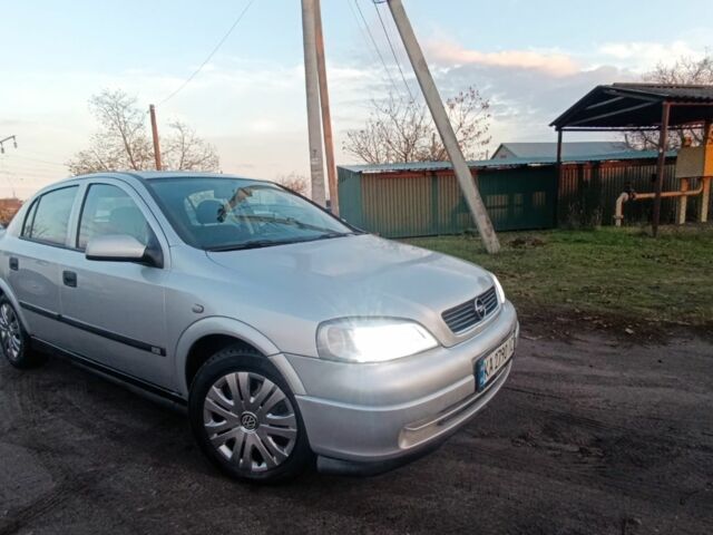 Серый Опель ГТ, объемом двигателя 1.6 л и пробегом 145 тыс. км за 2600 $, фото 4 на Automoto.ua