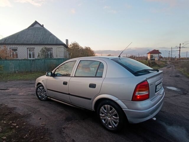 Серый Опель ГТ, объемом двигателя 1.6 л и пробегом 145 тыс. км за 2600 $, фото 2 на Automoto.ua