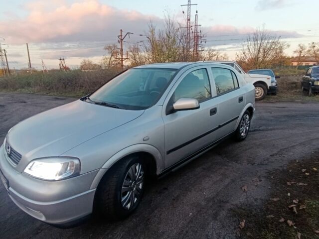 Серый Опель ГТ, объемом двигателя 1.6 л и пробегом 145 тыс. км за 2600 $, фото 1 на Automoto.ua