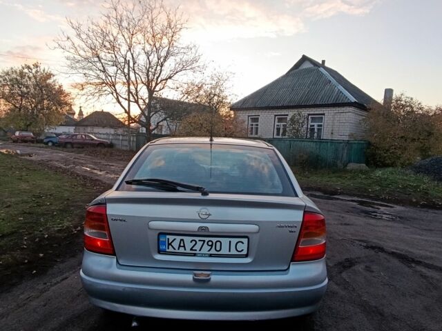 Серый Опель ГТ, объемом двигателя 1.6 л и пробегом 145 тыс. км за 2600 $, фото 3 на Automoto.ua