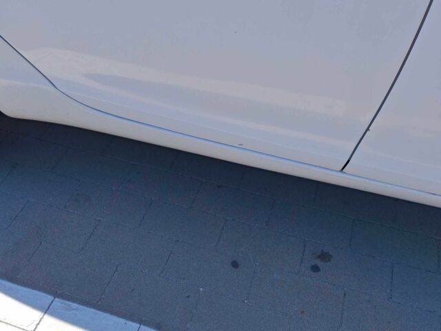 Білий Опель Інсігнія, об'ємом двигуна 2 л та пробігом 172 тис. км за 7700 $, фото 4 на Automoto.ua