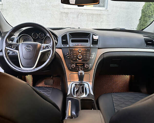 Белый Опель Инсигния, объемом двигателя 2 л и пробегом 265 тыс. км за 6500 $, фото 7 на Automoto.ua