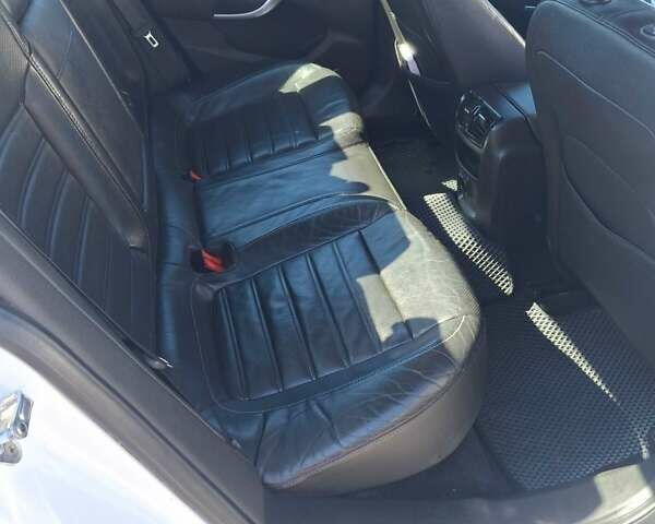 Белый Опель Инсигния, объемом двигателя 2 л и пробегом 172 тыс. км за 8300 $, фото 10 на Automoto.ua