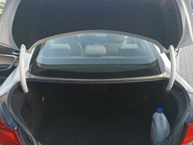 Белый Опель Инсигния, объемом двигателя 2 л и пробегом 274 тыс. км за 6500 $, фото 6 на Automoto.ua