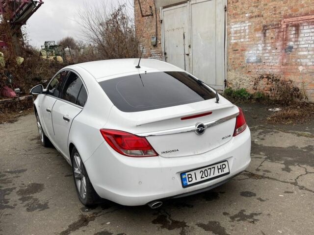 Білий Опель Інсігнія, об'ємом двигуна 2 л та пробігом 185 тис. км за 3750 $, фото 2 на Automoto.ua