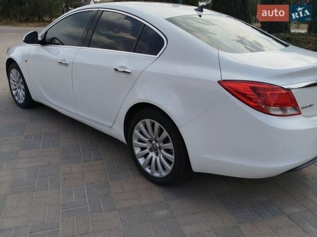 Білий Опель Інсігнія, об'ємом двигуна 1.96 л та пробігом 237 тис. км за 6599 $, фото 28 на Automoto.ua