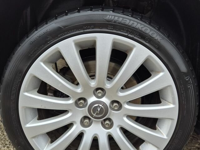 Білий Опель Інсігнія, об'ємом двигуна 2 л та пробігом 145 тис. км за 8950 $, фото 21 на Automoto.ua