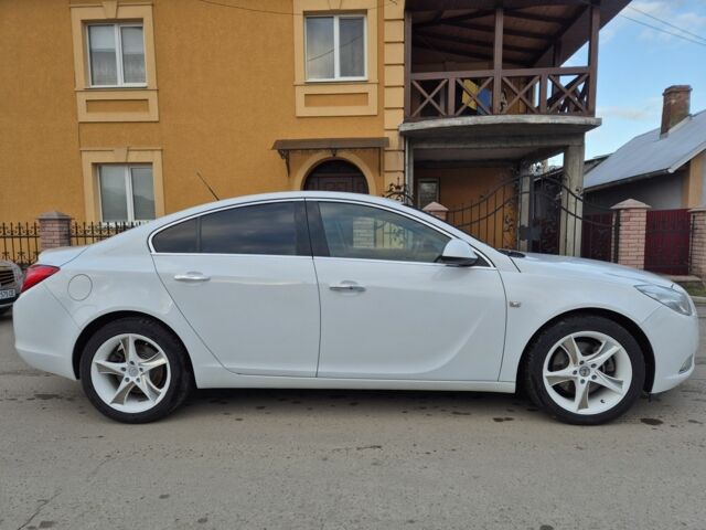 Білий Опель Інсігнія, об'ємом двигуна 2 л та пробігом 145 тис. км за 8950 $, фото 5 на Automoto.ua