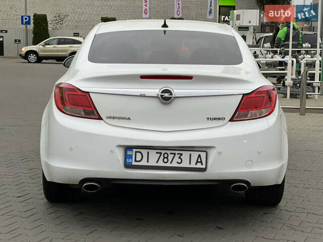 Белый Опель Инсигния, объемом двигателя 2 л и пробегом 325 тыс. км за 5350 $, фото 6 на Automoto.ua
