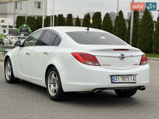 Белый Опель Инсигния, объемом двигателя 2 л и пробегом 325 тыс. км за 5350 $, фото 7 на Automoto.ua