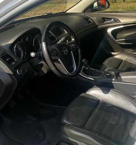 Белый Опель Инсигния, объемом двигателя 1.96 л и пробегом 212 тыс. км за 8800 $, фото 5 на Automoto.ua