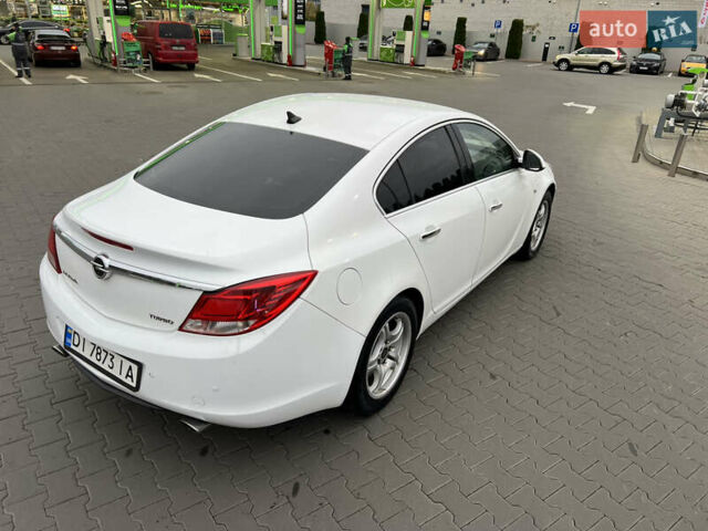 Белый Опель Инсигния, объемом двигателя 2 л и пробегом 325 тыс. км за 5350 $, фото 8 на Automoto.ua