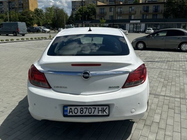 Білий Опель Інсігнія, об'ємом двигуна 2 л та пробігом 195 тис. км за 5398 $, фото 2 на Automoto.ua