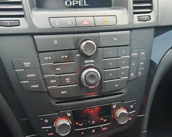 Білий Опель Інсігнія, об'ємом двигуна 2 л та пробігом 149 тис. км за 8200 $, фото 16 на Automoto.ua