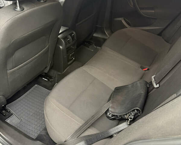 Белый Опель Инсигния, объемом двигателя 1.4 л и пробегом 158 тыс. км за 9800 $, фото 9 на Automoto.ua