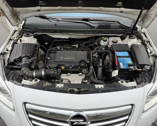 Белый Опель Инсигния, объемом двигателя 1.4 л и пробегом 158 тыс. км за 9800 $, фото 5 на Automoto.ua