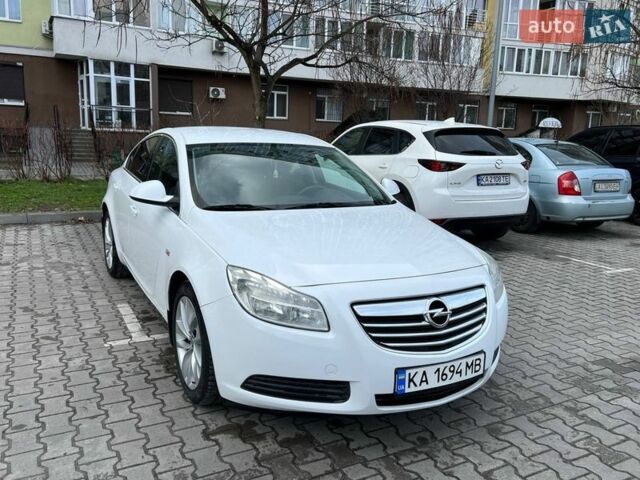 Білий Опель Інсігнія, об'ємом двигуна 2 л та пробігом 178 тис. км за 6800 $, фото 6 на Automoto.ua