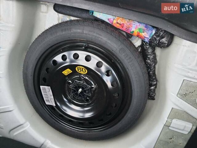 Білий Опель Інсігнія, об'ємом двигуна 2 л та пробігом 149 тис. км за 8200 $, фото 27 на Automoto.ua