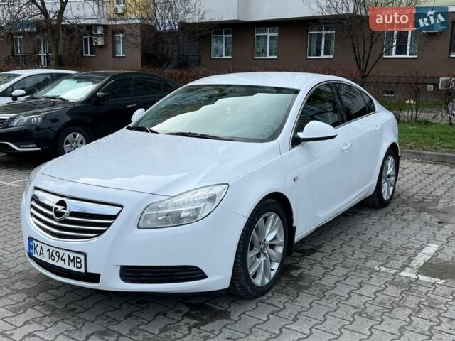 Білий Опель Інсігнія, об'ємом двигуна 2 л та пробігом 178 тис. км за 6800 $, фото 3 на Automoto.ua