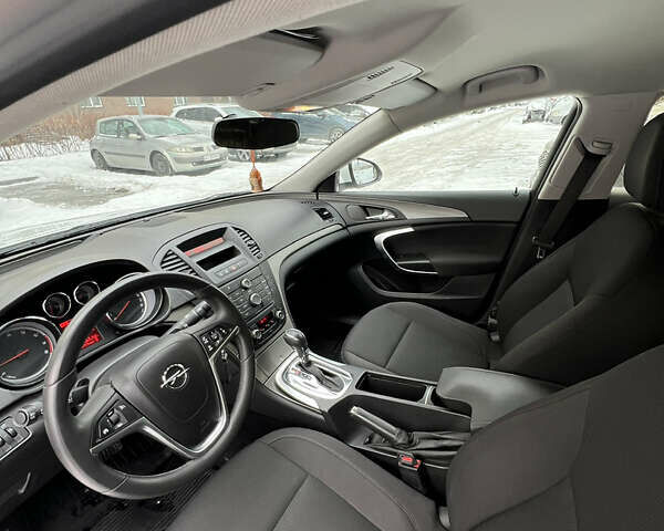 Белый Опель Инсигния, объемом двигателя 2 л и пробегом 177 тыс. км за 7400 $, фото 22 на Automoto.ua