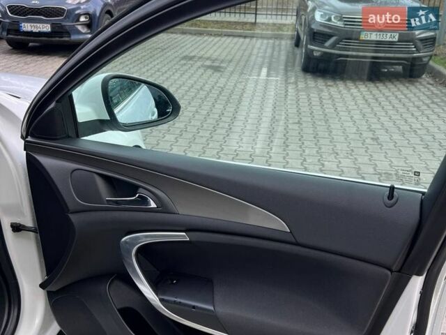 Білий Опель Інсігнія, об'ємом двигуна 2 л та пробігом 178 тис. км за 6800 $, фото 18 на Automoto.ua