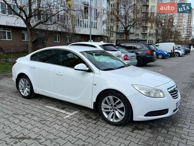 Білий Опель Інсігнія, об'ємом двигуна 2 л та пробігом 178 тис. км за 6800 $, фото 4 на Automoto.ua