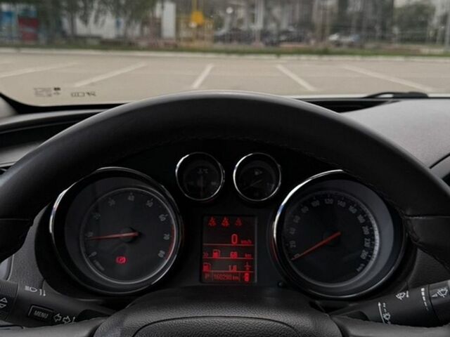 Білий Опель Інсігнія, об'ємом двигуна 2 л та пробігом 160 тис. км за 8400 $, фото 8 на Automoto.ua