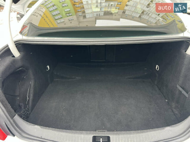 Белый Опель Инсигния, объемом двигателя 2 л и пробегом 177 тыс. км за 7400 $, фото 38 на Automoto.ua