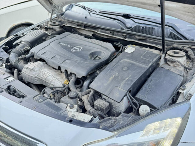Білий Опель Інсігнія, об'ємом двигуна 1.96 л та пробігом 225 тис. км за 6900 $, фото 7 на Automoto.ua