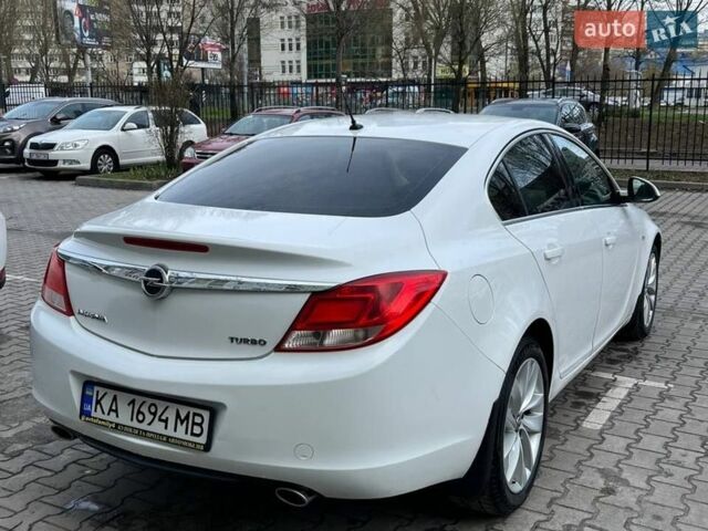 Білий Опель Інсігнія, об'ємом двигуна 2 л та пробігом 178 тис. км за 6800 $, фото 10 на Automoto.ua