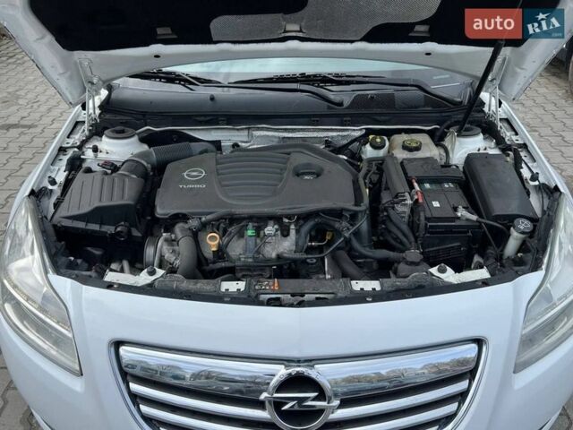 Білий Опель Інсігнія, об'ємом двигуна 2 л та пробігом 178 тис. км за 6800 $, фото 24 на Automoto.ua