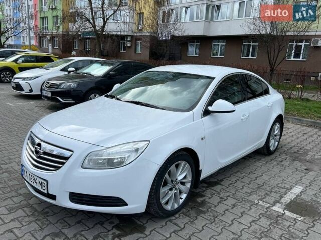 Білий Опель Інсігнія, об'ємом двигуна 2 л та пробігом 178 тис. км за 6800 $, фото 5 на Automoto.ua